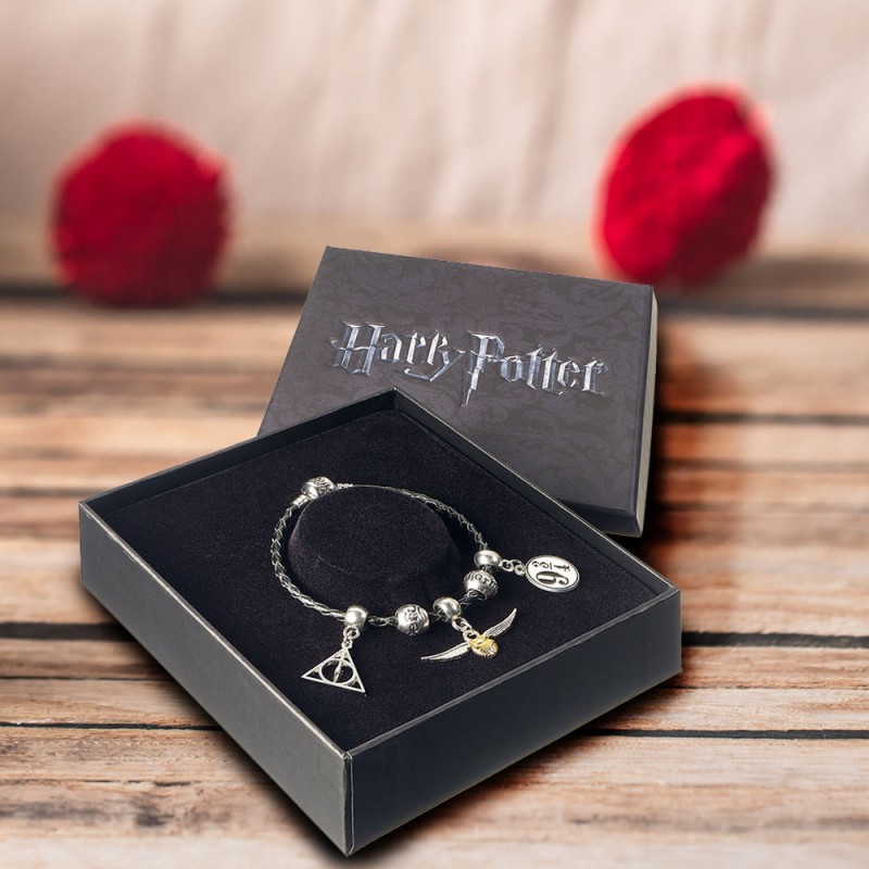 Bijou Harry Potter : bracelet avec 3 pendentifs livré dans son